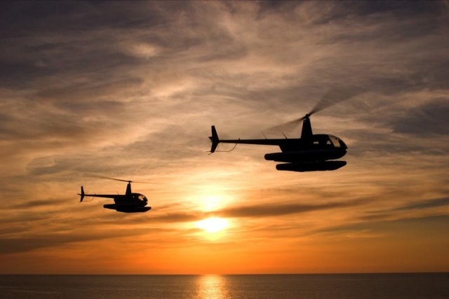 Helicopteros al atardecer
